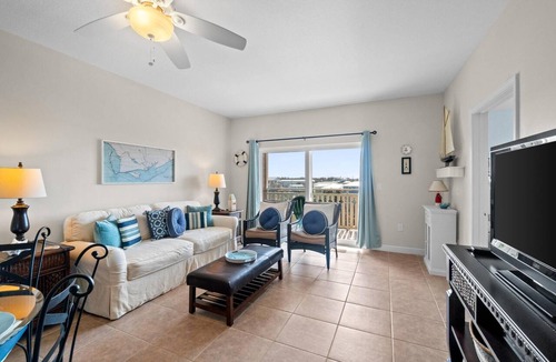 Waterside Village Condo | Waterside Village 408 - Stunning Gulf Views, Pool + Day Dock - Free Golf Daily!