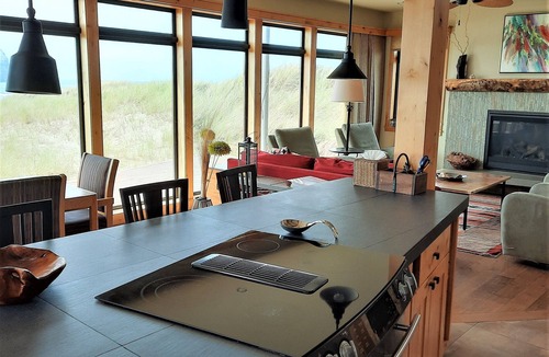 Pacific City House | Welcome to Flotsam! A stunning oceanfront home with iconic Haystack Rock views.