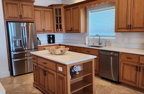 Gulf Breeze House | Your Bayfront Retreat with Stunning Water Views, Private Pool, and Dock.