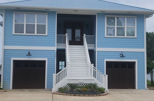 Gulf Breeze House | Your Bayfront Retreat with Stunning Water Views, Private Pool, and Dock.