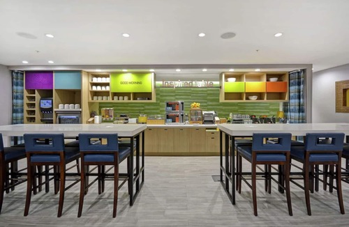 Alpine Center Hotel | Your Michigan Adventure: Minutes to Treetop Family Adventure | FREE Breakfast