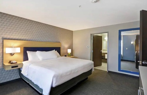 Alpine Center Hotel | Your Michigan Adventure: Minutes to Treetop Family Adventure | FREE Breakfast