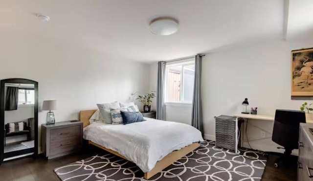 A pied-à-terre near bistros, shops, and sports stadium w/parking and EV charger