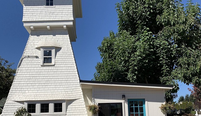 A welcoming 1905 watertower on a beautiful flower farm with a hot tub