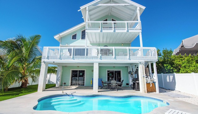 Beautiful 3BR/3BA Canal Home with Pool, Modern Upgrades, Dock for 28' Boat, Fenced Backyard
