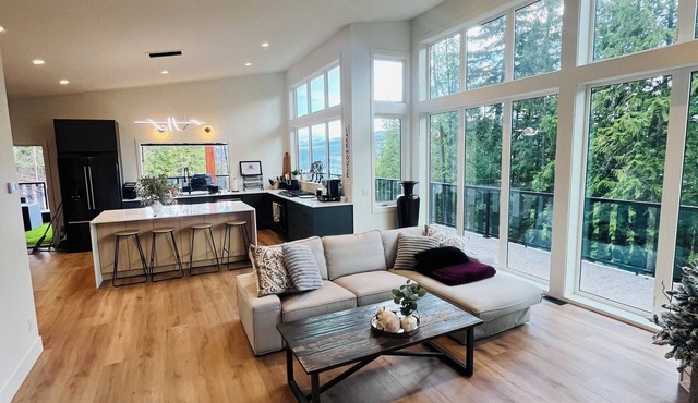 Breathtaking 4-bedroom retreat on 2.5 private acres with views you won’t forget! in Anglemont