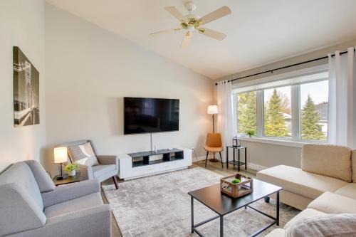 Bright Little Chute Condo w/Deck & Yard!