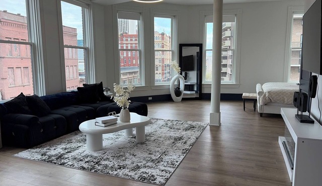 Bright Sunlit Studio in Downtown Rochester Floor-to-Ceiling Windows in Rochester