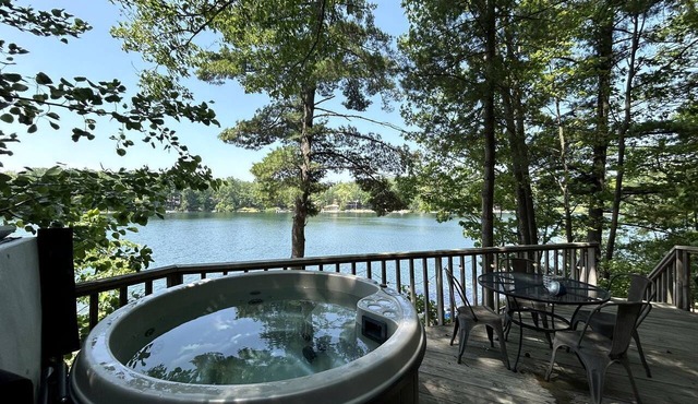 Charming Lakefront Cabin with Hot Tub and Beach Access near Traverse City, Michigan
