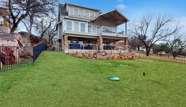 Charming lakefront home with lake views, dock & entertainment