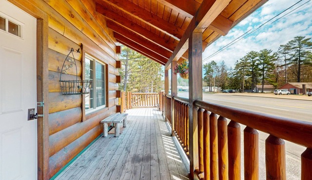 Charming lakefront cabin with fireplace, cozy interior, streaming, & partial AC
