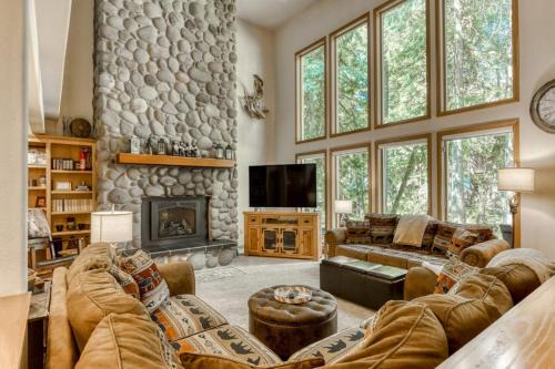 Classic riverfront home with great views game room hot tub & modern cabin feel