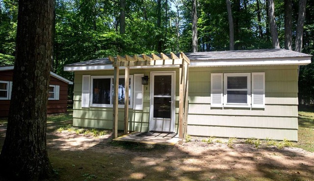Cozy Cabin Escape to Lake Michigan in this Charming Glamping Getaway for Four