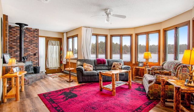 Cozy lakefront cabin with woodstove, deck, gym, indoor pool, & hot tubs