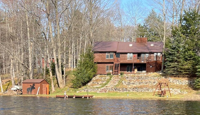 Custom-built private, picturesque Cabin on 1.28-acre lot on Page Lake waterfront