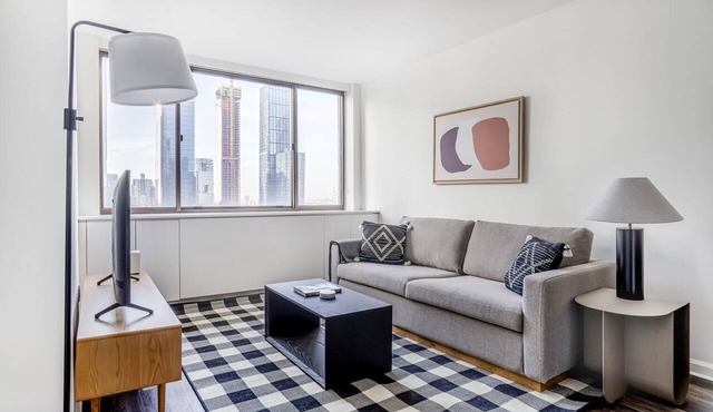 Deluxe Midtown West 2BR w/Doorman, Gym & W/D, nr Times Sq, by Blueground