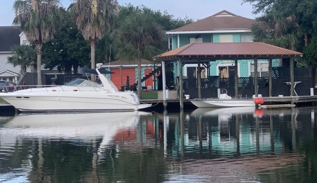 Enjoy this serene waterfront getaway with boat dock and deck.