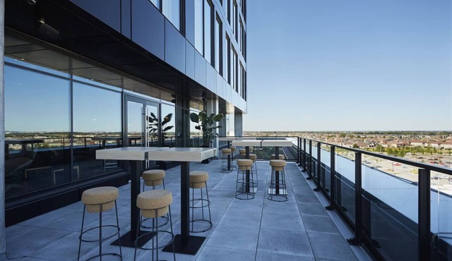 Experience Urban Chic Design in Spacious Room Walking Distance to Cafés & Bars in Brossard