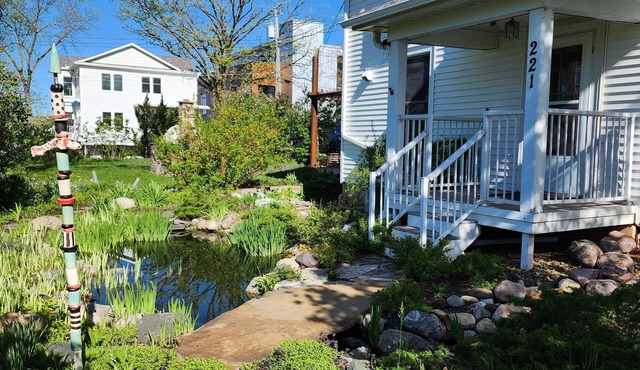 Garden setting within walking distance of River, Local Shops, and Restaurants!