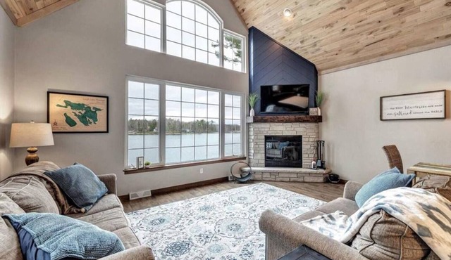 Highlights: Private beach just steps from your door Includes kayaks for exploring the lake Great fishing right off the shoreline or dock Bring your boat and enjoy full boating access Cozy indoor fireplace for cool evenings 4 spaciou