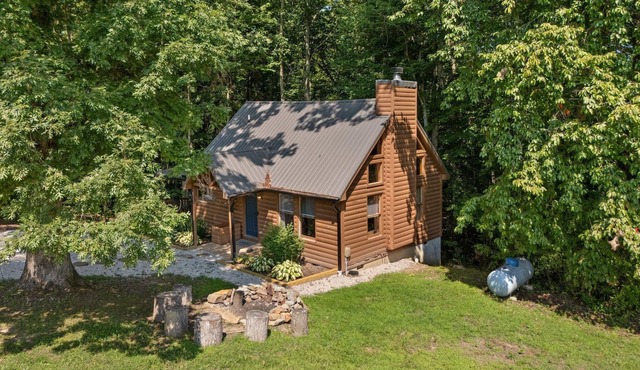 Inviting, charming 2BR, log cabin located in the Scenic Heights neighborhood.