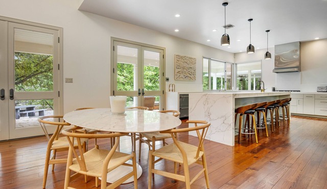 Inviting waterfront home with pool, patio, fireplace, W/D, & dog-friendly in Hunt
