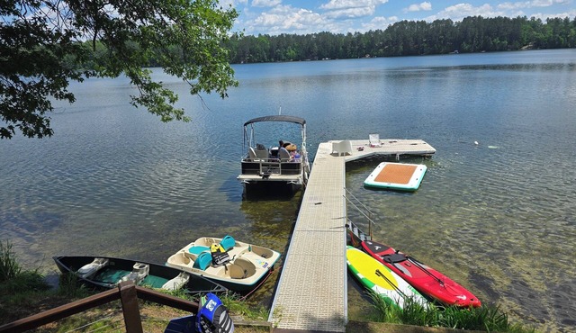 Lakefront Retreat with Sandy Beach, Swim Area & Relaxing Lakeside Seating!