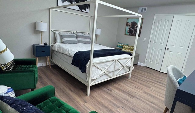 Large secondary primary bedroom with private bathroom in peaceful, stylish home