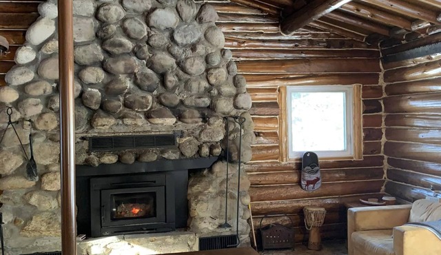 Log Cabin Getaway - rustic-chic - waterfront, dock, firepit & indoor fireplace! in Duhamel