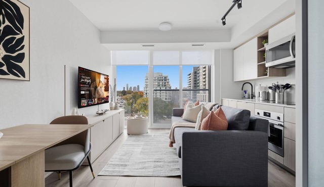 Modern 2BR Condo Panoramic Views & Free Parking in Toronto