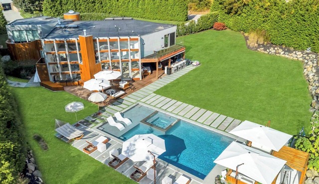 Modern, resort-style retreat in the heart of Shinnecock Hills, luxurious.