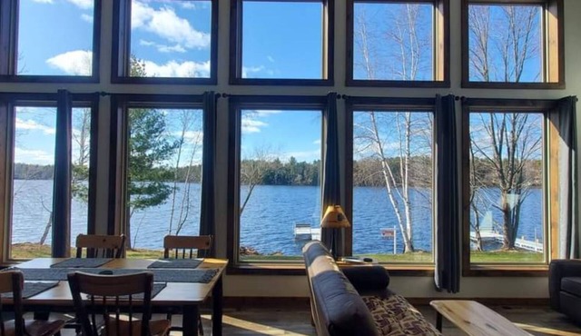 New waterfront cabin with expansive lake-facing windows, Long Lake, Phillips