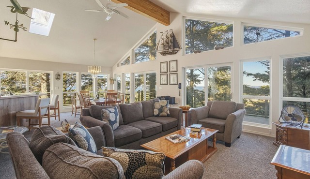 Peaceful 4BR Cape Meares Home | Ocean Views, Forest Setting, Wraparound Deck + King Bed
