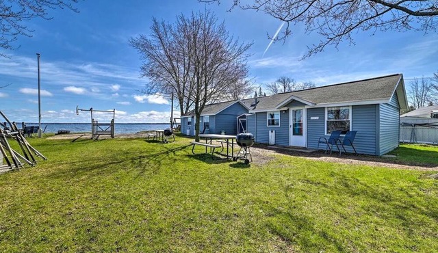Pet-Friendly Lake Cabin with Dock & Kayaks & Fire Pit in Houghton Lake, Michigan
