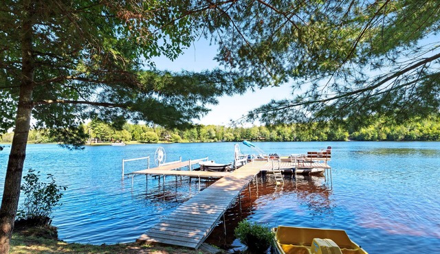 Picturesque waterfront cabin w/a deck, firepit, & recreational pier