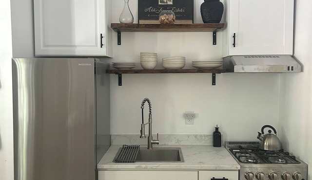 Private garden district apartment