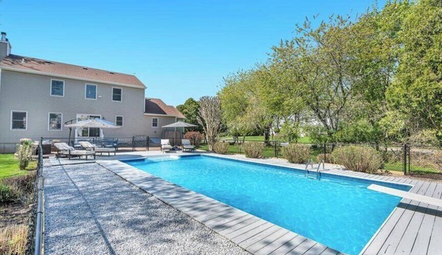 Relaxing Greenport Escape with a Fenced Pool, Private Beach with Mooring.
