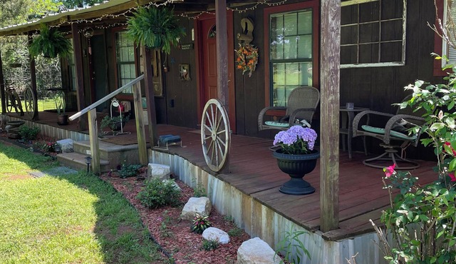 Rustic ranch retreat with access to private saltwater pool.