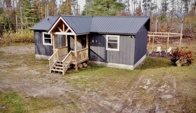 Secluded Rustic Cabin with Hot Tub Near Pere Marquette River in Big Rapids, Michigan