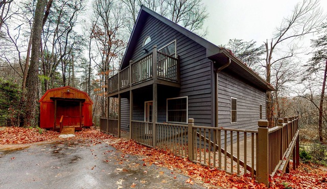 Serene Wooded Escape near the Lake W/ Free WiFi, Wraparound Deck, & Balcony