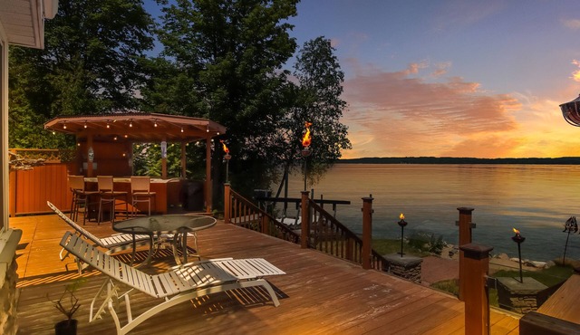 Spacious LAKE FRONT home w/100' DOCK & Hot tub on Elk Lake mins to TORCH LAKE