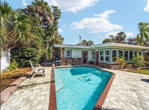 Spacious Waterfront Getaway with Heated Pool