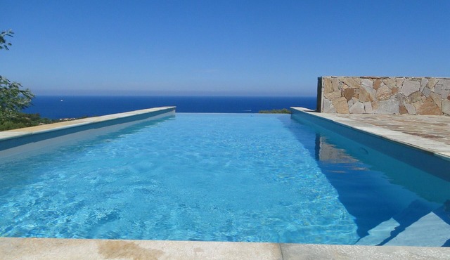 Splendid architect-designed villa above Ile Rousse with 180° sea view in Corbara