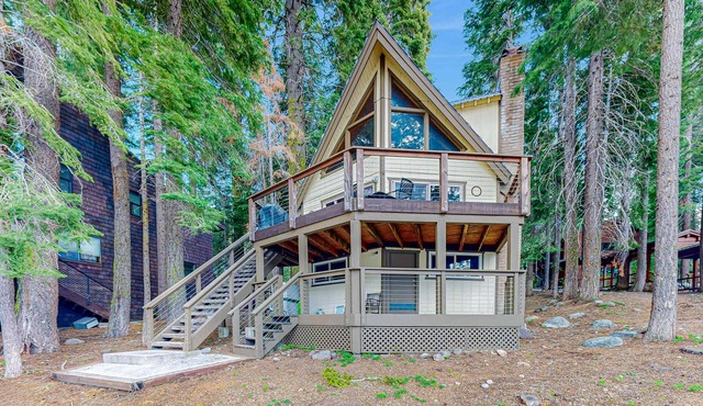 Superb lakefront home with mountain & lake views, fireplace, tennis & washer&dryer