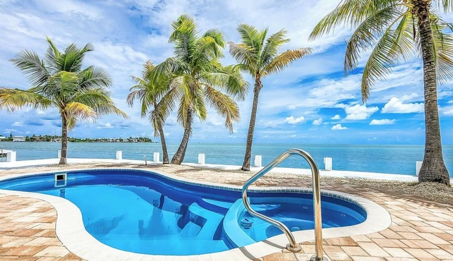 Swept Away – 3BR/2BA Keys Retreat with Pool, Dock & Stunning Open Water Views