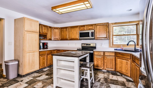Tree-lined home with gas grill, firepit, & fireplace - walk to lake