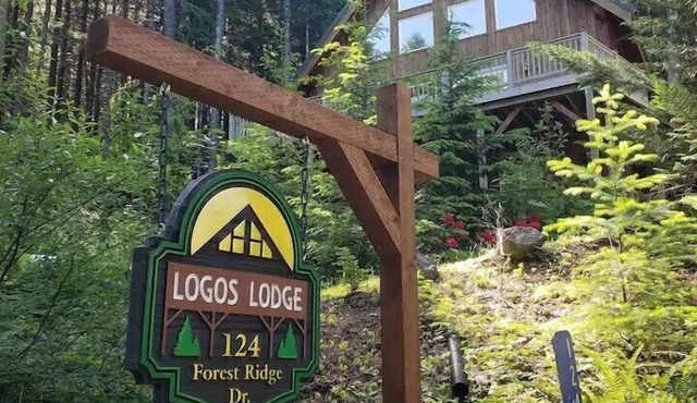 Tri-level, 9 guest, 4 bedroom, 2 bathroom home with hot tub and game room.