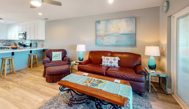 Updated home across from beach with firepit, sunroom, & fast WiFi - snowbirds OK