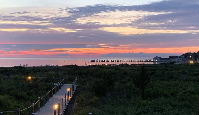 Updated Modern Waterfront condo with private beach, pool, tennis, pier & more.