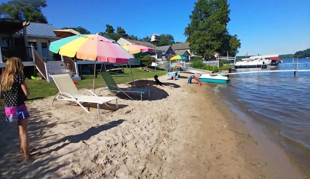 Very Clean Lakefront Home with Sandy Beach and Clear water.